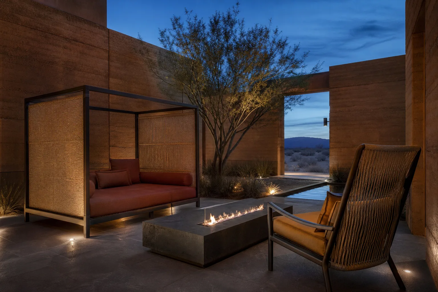 Desert hotel courtyard with shaded daybed, fire table and woven lounge chair
