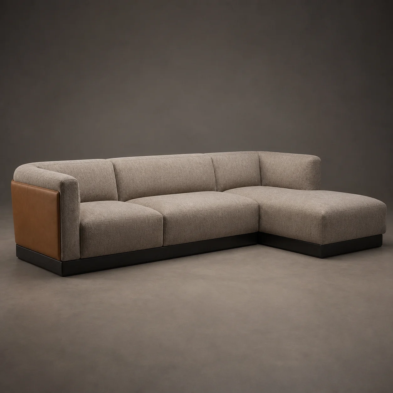 Hearth Modular Sofa studio concept visual in warm stone wool, saddle leather end panel, charred plinth