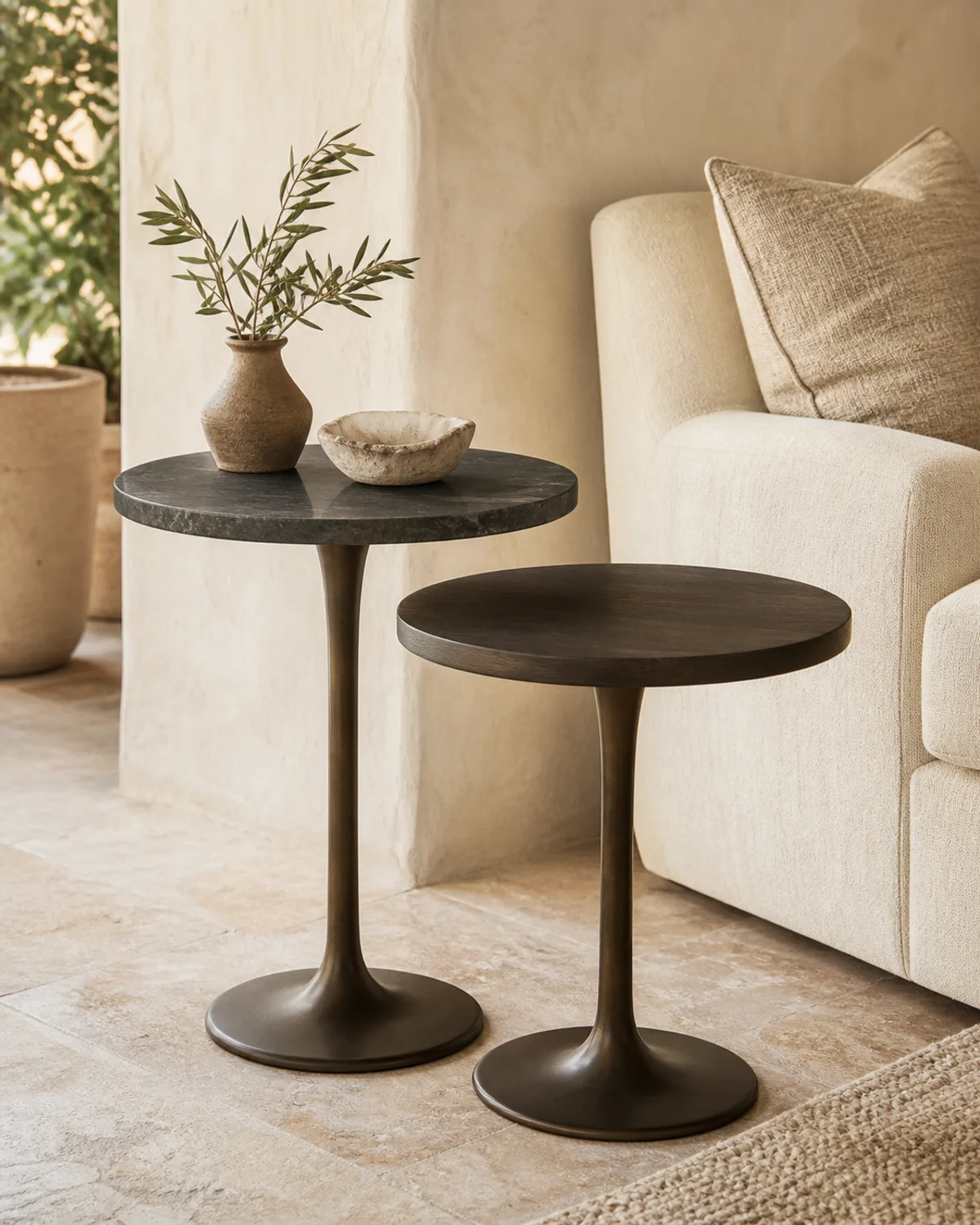 Elegant nesting side tables beside lounge seating in a luxury interior — Mediterranean hotel lookbook