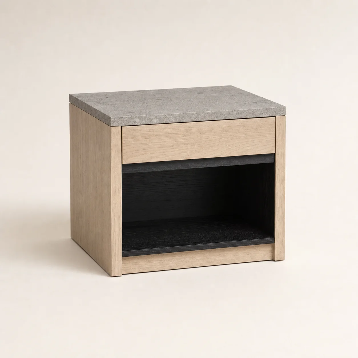 Sumi Night Table studio concept visual in pale ash, charcoal recess, honed grey stone