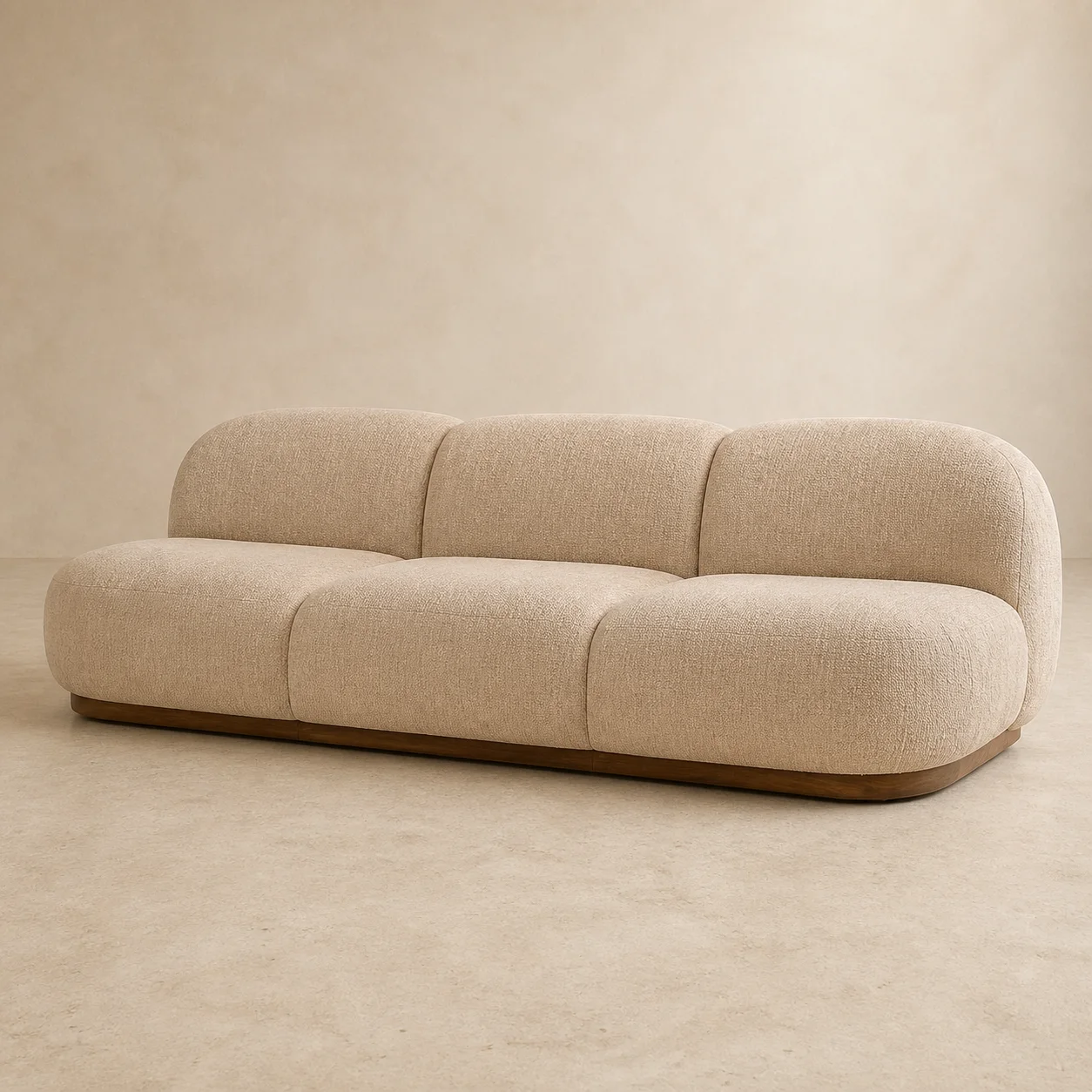 Selva Cloud Sofa studio concept visual in warm sand linen, dark honey-timber plinth