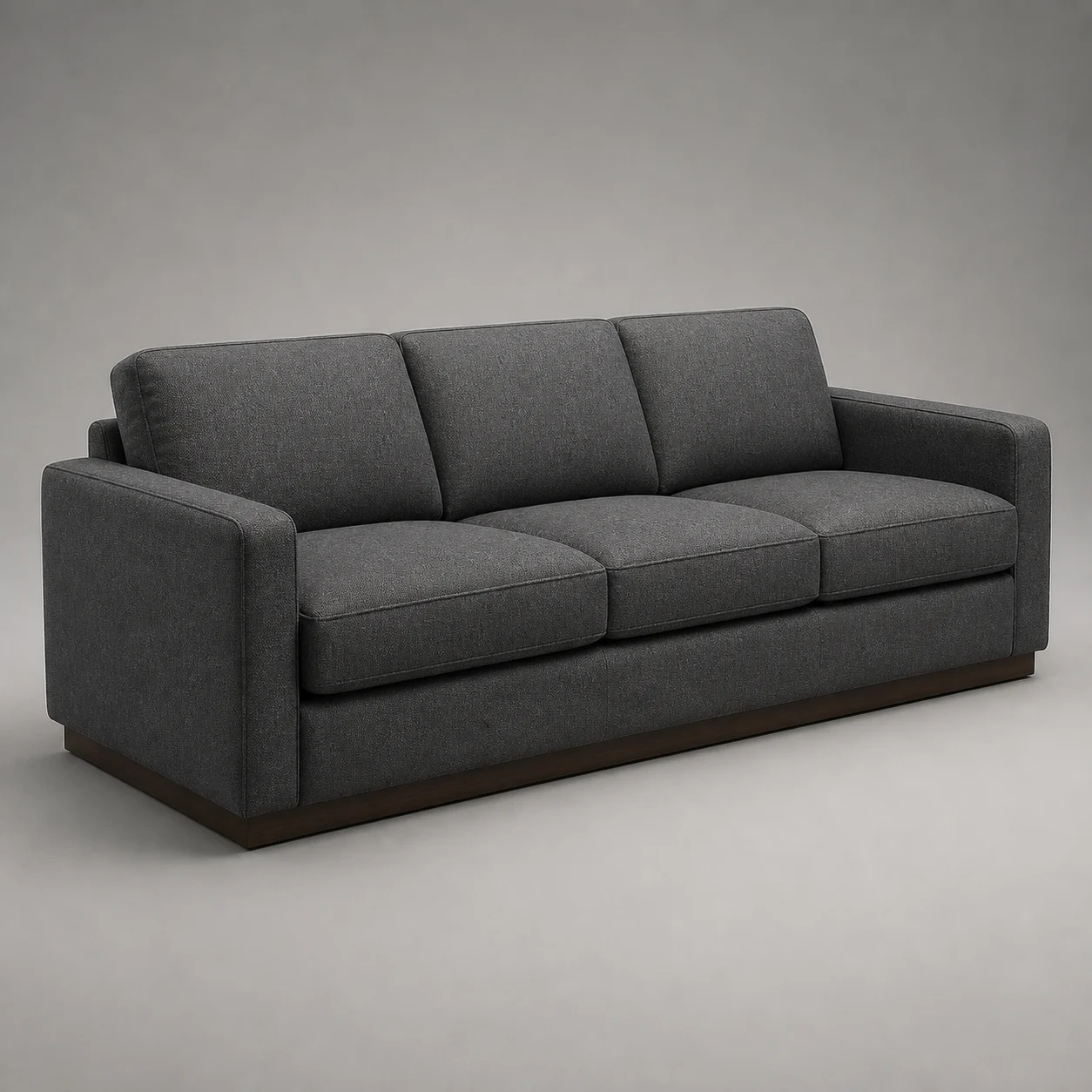 Forum Convertible Sofa studio concept visual in slate textile, smoked-walnut plinth