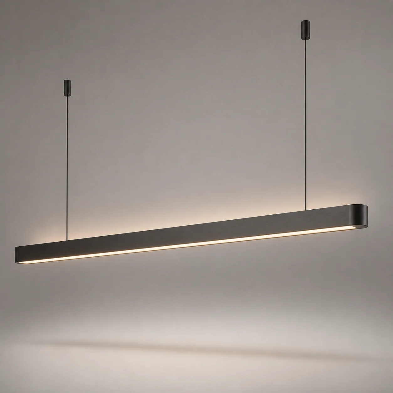 Line Linear Pendant studio concept visual in satin gunmetal, warm opal light