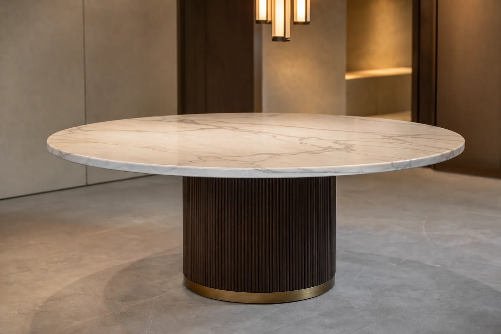 Round cream marble dining table with fluted dark wood pedestal base