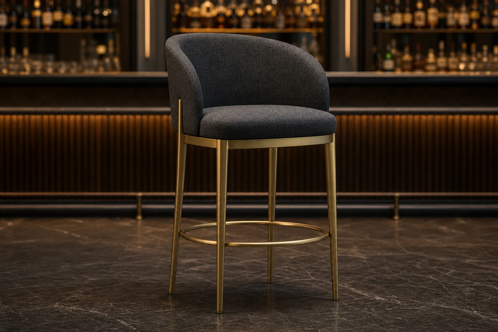 Charcoal upholstered bar stool with brushed brass frame and circular footrest
